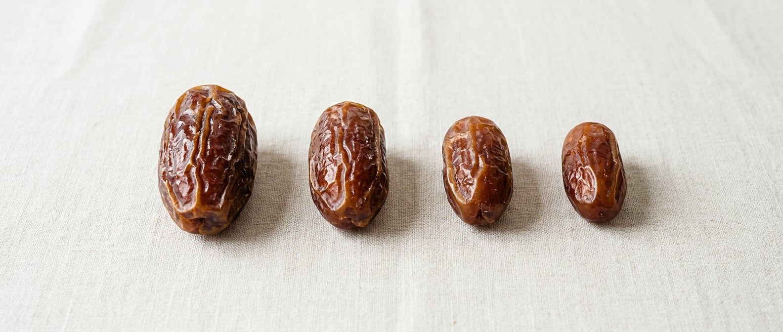 Four Medjool dates in a row